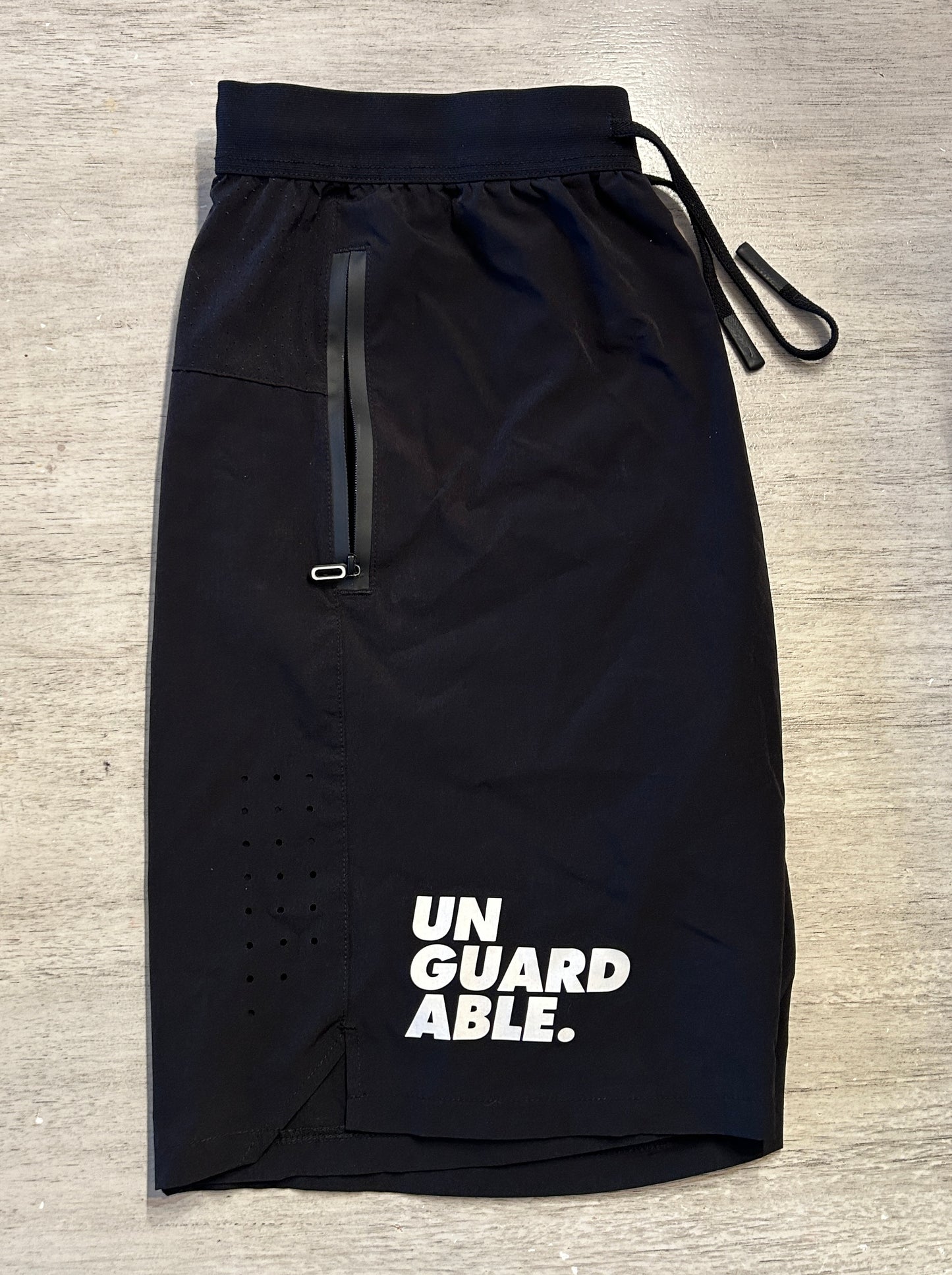 UNGUARDABLE Performance Shorts (Stacked Logo)