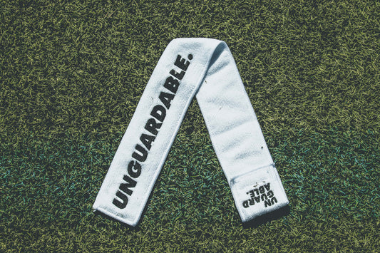 UNGUARDABLE Football Streamer Towel (White, Vertical Logo)