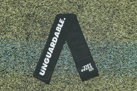 UNGUARDABLE Football Streamer Towel (Black, Vertical Logo)